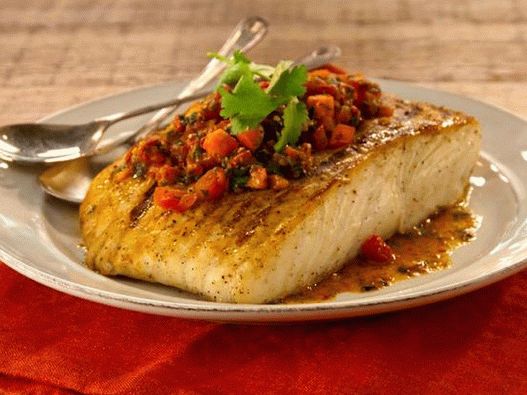 Poisson blanc grillé avec des encres