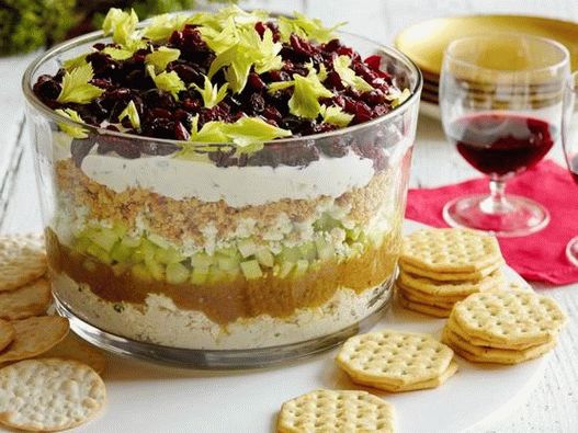 Photo d'une trempette cobb à sept couches avec des canneberges