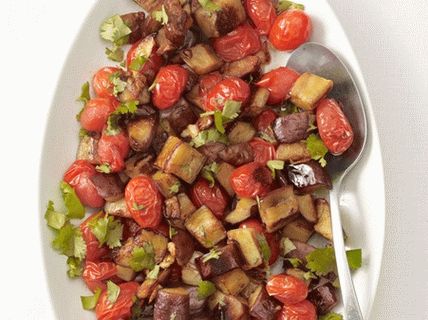 Photo Stear-fry aux aubergines et tomates raisins