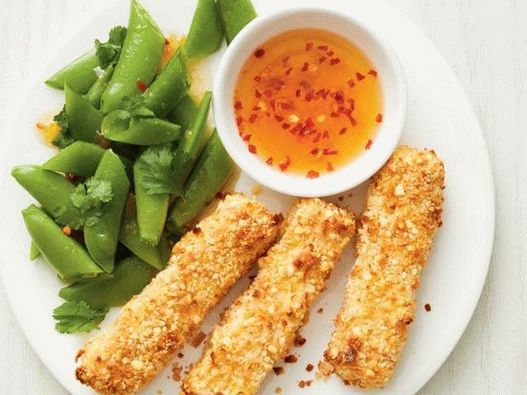 Photo de tofu dans une chapelure à la noix de coco avec confiture d'abricot et petits pois