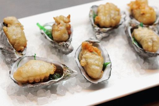 Photo d'huître en test de tempura avec vinaigrette
